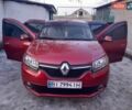 Красный Рено Логан, объемом двигателя 1.6 л и пробегом 231 тыс. км за 5800 $, фото 1 на Automoto.ua