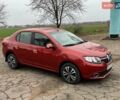 Красный Рено Логан, объемом двигателя 1.6 л и пробегом 273 тыс. км за 5550 $, фото 1 на Automoto.ua