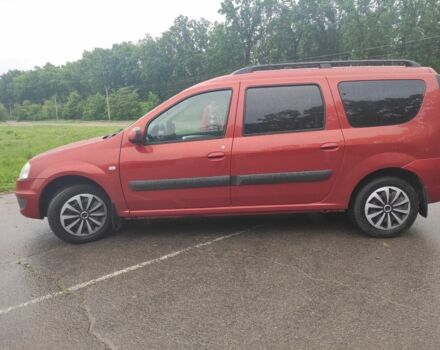 Красный Рено Логан, объемом двигателя 1.6 л и пробегом 182 тыс. км за 5999 $, фото 1 на Automoto.ua