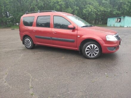 Червоний Рено Логан, об'ємом двигуна 1.6 л та пробігом 182 тис. км за 5999 $, фото 1 на Automoto.ua