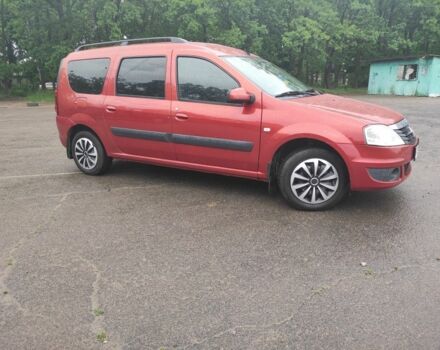 Красный Рено Логан, объемом двигателя 1.6 л и пробегом 182 тыс. км за 5999 $, фото 1 на Automoto.ua