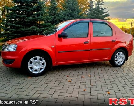 Красный Рено Логан, объемом двигателя 1.4 л и пробегом 130 тыс. км за 6450 $, фото 1 на Automoto.ua