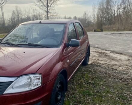 Красный Рено Логан, объемом двигателя 1.4 л и пробегом 179 тыс. км за 1850 $, фото 1 на Automoto.ua