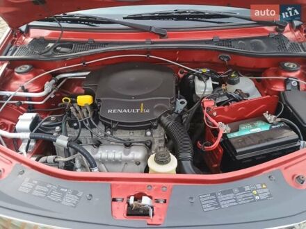 Красный Рено Логан, объемом двигателя 1.4 л и пробегом 129 тыс. км за 6400 $, фото 1 на Automoto.ua