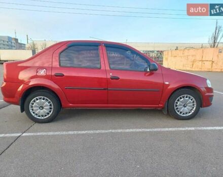 Красный Рено Логан, объемом двигателя 1.4 л и пробегом 176 тыс. км за 5200 $, фото 1 на Automoto.ua