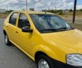 Желтый Рено Логан, объемом двигателя 1.4 л и пробегом 171 тыс. км за 4100 $, фото 1 на Automoto.ua