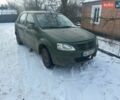 Желтый Рено Логан, объемом двигателя 1.39 л и пробегом 300 тыс. км за 880 $, фото 1 на Automoto.ua