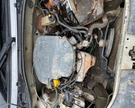 Серый Рено Логан, объемом двигателя 1.8 л и пробегом 80 тыс. км за 650 $, фото 2 на Automoto.ua