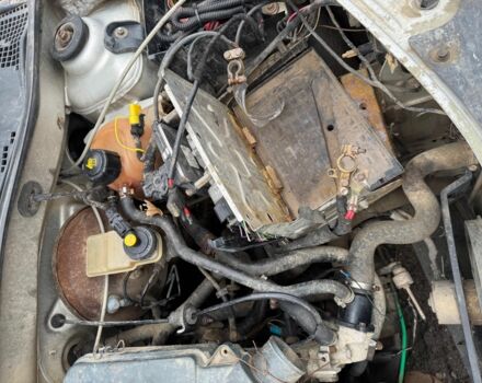 Серый Рено Логан, объемом двигателя 1.8 л и пробегом 80 тыс. км за 650 $, фото 1 на Automoto.ua