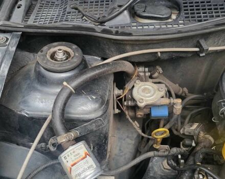 Серый Рено Логан, объемом двигателя 1.4 л и пробегом 211 тыс. км за 2499 $, фото 6 на Automoto.ua