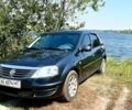Серый Рено Логан, объемом двигателя 1.3 л и пробегом 158 тыс. км за 5404 $, фото 1 на Automoto.ua