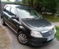 Серый Рено Логан, объемом двигателя 1.4 л и пробегом 214 тыс. км за 4499 $, фото 1 на Automoto.ua