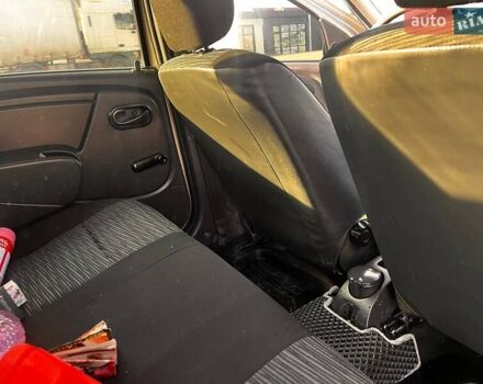 Серый Рено Логан, объемом двигателя 1.39 л и пробегом 296 тыс. км за 3500 $, фото 11 на Automoto.ua