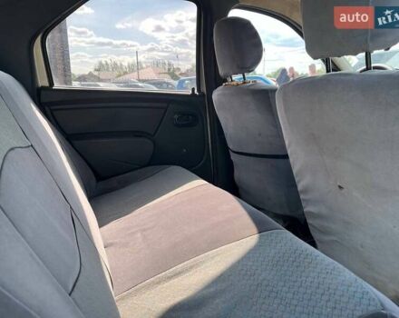 Серый Рено Логан, объемом двигателя 1.39 л и пробегом 218 тыс. км за 2900 $, фото 19 на Automoto.ua