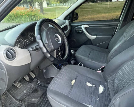 Серый Рено Логан, объемом двигателя 1.4 л и пробегом 315 тыс. км за 4400 $, фото 4 на Automoto.ua