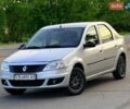 Серый Рено Логан, объемом двигателя 1.39 л и пробегом 300 тыс. км за 4350 $, фото 1 на Automoto.ua