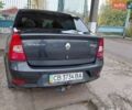 Серый Рено Логан, объемом двигателя 1.4 л и пробегом 228 тыс. км за 4500 $, фото 2 на Automoto.ua