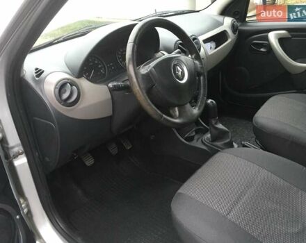 Серый Рено Логан, объемом двигателя 1.39 л и пробегом 302 тыс. км за 4500 $, фото 11 на Automoto.ua