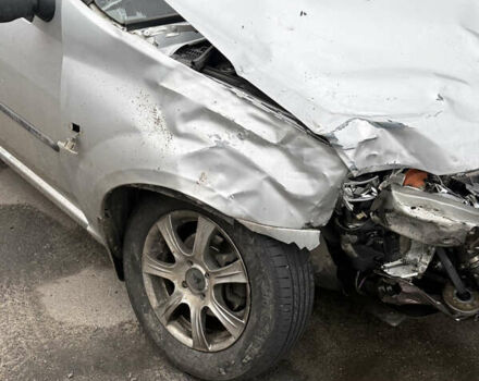 Серый Рено Логан, объемом двигателя 1.46 л и пробегом 119 тыс. км за 1800 $, фото 1 на Automoto.ua