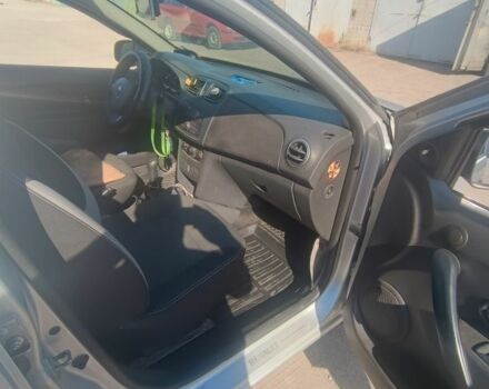 Серый Рено Логан, объемом двигателя 1.6 л и пробегом 220 тыс. км за 5800 $, фото 5 на Automoto.ua