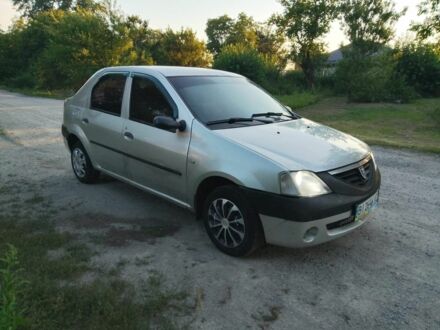 Серый Рено Логан, объемом двигателя 1.4 л и пробегом 279 тыс. км за 2400 $, фото 1 на Automoto.ua