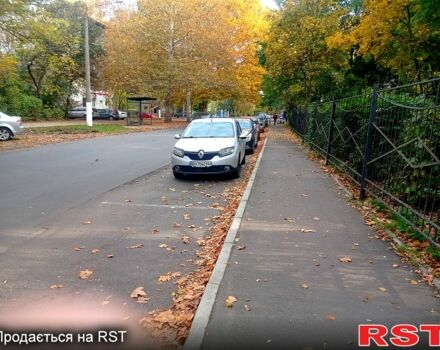 Серый Рено Логан, объемом двигателя 1.5 л и пробегом 380 тыс. км за 4200 $, фото 1 на Automoto.ua