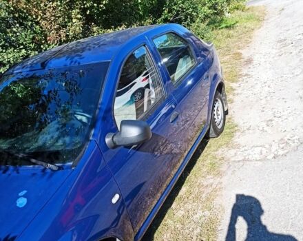 Синий Рено Логан, объемом двигателя 1 л и пробегом 79 тыс. км за 3300 $, фото 4 на Automoto.ua