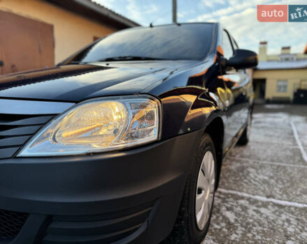 Синій Рено Логан, об'ємом двигуна 1.39 л та пробігом 161 тис. км за 4650 $, фото 22 на Automoto.ua