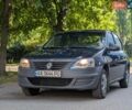 Синій Рено Логан, об'ємом двигуна 1.39 л та пробігом 313 тис. км за 2950 $, фото 1 на Automoto.ua