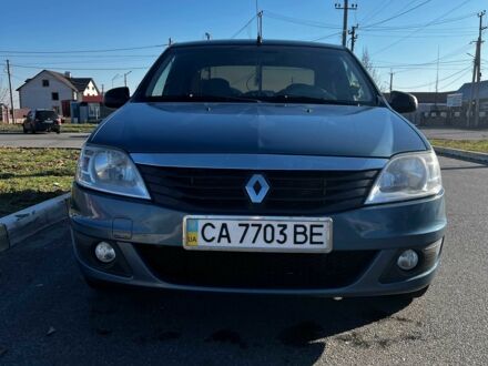 Синий Рено Логан, объемом двигателя 1.4 л и пробегом 306 тыс. км за 4100 $, фото 1 на Automoto.ua