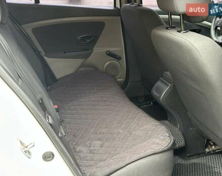 Белый Рено Меган, объемом двигателя 1.5 л и пробегом 275 тыс. км за 6440 $, фото 14 на Automoto.ua