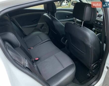 Белый Рено Меган, объемом двигателя 1.5 л и пробегом 210 тыс. км за 6450 $, фото 29 на Automoto.ua