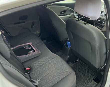 Білий Рено Меган, об'ємом двигуна 1.46 л та пробігом 199 тис. км за 6100 $, фото 11 на Automoto.ua