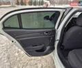 Білий Рено Меган, об'ємом двигуна 1.46 л та пробігом 309 тис. км за 11700 $, фото 20 на Automoto.ua