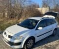 Белый Рено Меган, объемом двигателя 1.5 л и пробегом 304 тыс. км за 4400 $, фото 1 на Automoto.ua