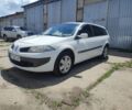 Белый Рено Меган, объемом двигателя 1.4 л и пробегом 123 тыс. км за 4499 $, фото 1 на Automoto.ua