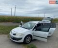 Белый Рено Меган, объемом двигателя 1.6 л и пробегом 298 тыс. км за 3850 $, фото 1 на Automoto.ua