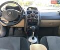 Белый Рено Меган, объемом двигателя 1.6 л и пробегом 225 тыс. км за 4600 $, фото 1 на Automoto.ua