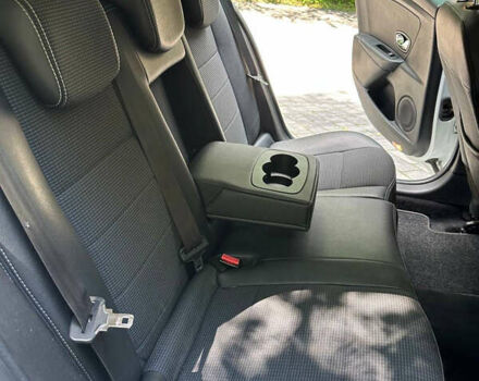 Белый Рено Меган, объемом двигателя 1.5 л и пробегом 230 тыс. км за 8299 $, фото 27 на Automoto.ua