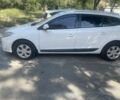 Белый Рено Меган, объемом двигателя 1.5 л и пробегом 235 тыс. км за 6498 $, фото 1 на Automoto.ua