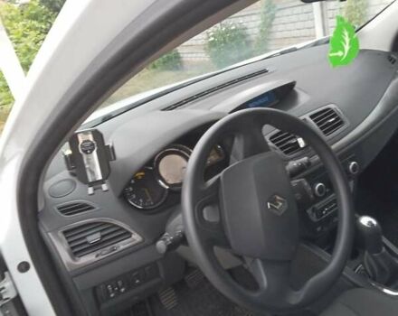 Белый Рено Меган, объемом двигателя 1.5 л и пробегом 200 тыс. км за 7600 $, фото 2 на Automoto.ua