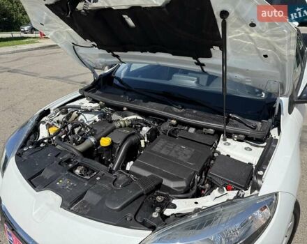 Белый Рено Меган, объемом двигателя 1.5 л и пробегом 225 тыс. км за 7699 $, фото 102 на Automoto.ua