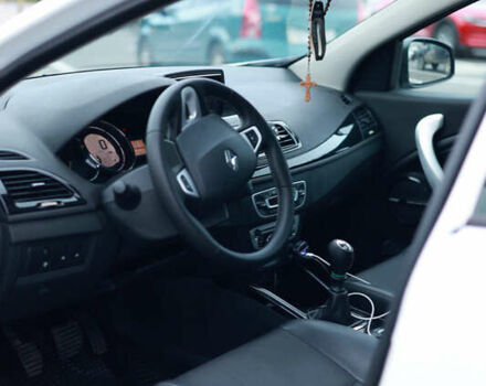 Рено Меган 2012 в Калуше на Automoto.ua Белый Рено Меган, объемом двигателя 1.5 л и пробегом 315 тыс. км за 8499 $, фото 12 на Automoto.ua