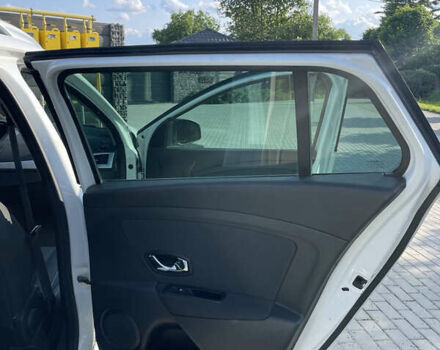 Белый Рено Меган, объемом двигателя 1.6 л и пробегом 372 тыс. км за 6100 $, фото 13 на Automoto.ua