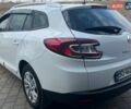 Білий Рено Меган, об'ємом двигуна 1.46 л та пробігом 259 тис. км за 7699 $, фото 10 на Automoto.ua