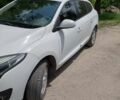 Белый Рено Меган, объемом двигателя 1.5 л и пробегом 200 тыс. км за 9800 $, фото 1 на Automoto.ua