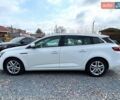 Білий Рено Меган, об'ємом двигуна 1.46 л та пробігом 259 тис. км за 11600 $, фото 1 на Automoto.ua