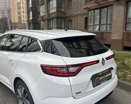 Білий Рено Меган, об'ємом двигуна 1.6 л та пробігом 220 тис. км за 11800 $, фото 4 на Automoto.ua