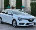 Белый Рено Меган, объемом двигателя 1.5 л и пробегом 220 тыс. км за 13000 $, фото 1 на Automoto.ua