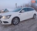 Білий Рено Меган, об'ємом двигуна 1.46 л та пробігом 200 тис. км за 11695 $, фото 1 на Automoto.ua